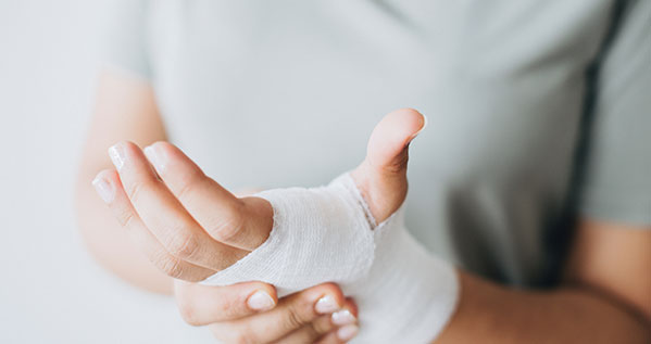 Victim with Bandage on Hand