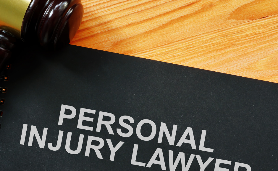 notebook with the words personal injury lawyer